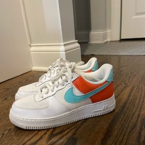 Nike Air Force 1 with orange and blue accents